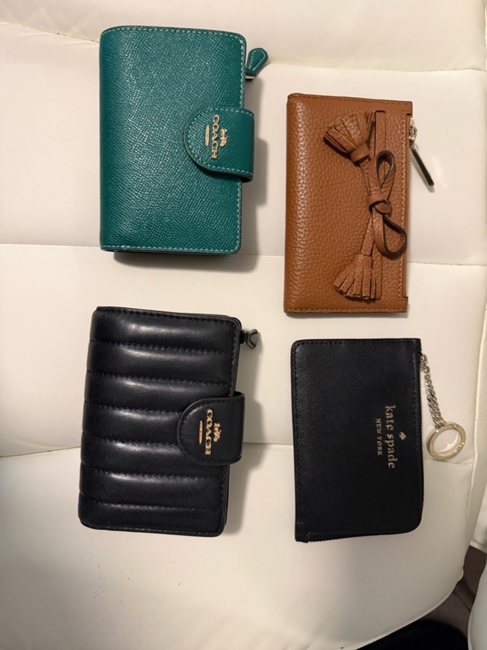 Coach and Kate Spade wallets